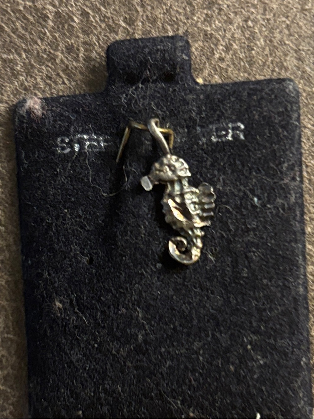 Vintage Sterling Silver Seahorse Pendant- on original card   .95”. $10